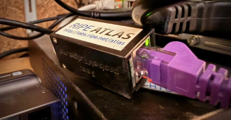 Photo of my installed RIPE Atlas hardware probe Photo of my installed RIPE Atlas hardware probe